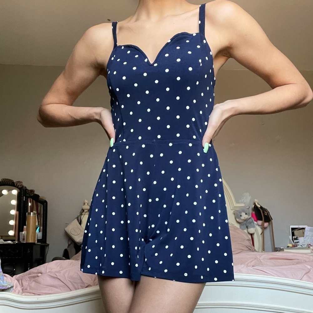 bow tie; open back romper